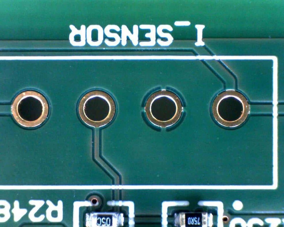  An example of a solid fill where there’s a thermal relief at the hole connected to the fill’s net (third from the left) and tracks going into or out of the holes that aren’t connected to that net.